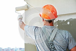 Builder facade plasterer worker