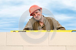 Builder with a hard hat