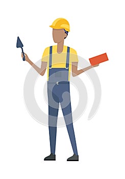 Builder in Helmet and Blue Uniform. Brick. Trowel