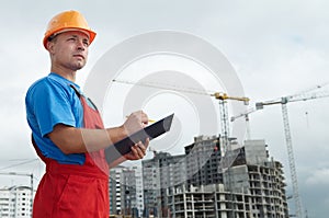 Builder inspector at construction photo