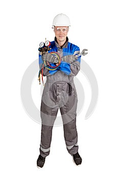 Builder, installer of ventilation with tools in hands