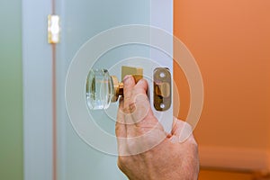 Builder in installing a door lock the door of a new house