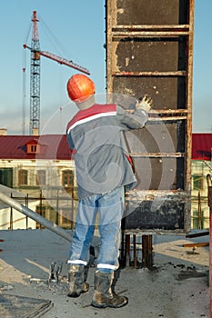 Builder installing formwork photo