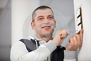 builder installing triple lightswitch