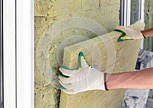 Builder insulates the outer walls with mineral sheet insulation