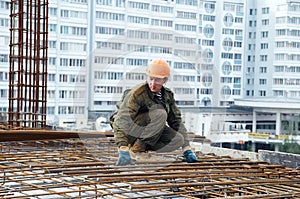 Builder making reinforcement