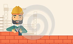 Builder man is building a brick wall.