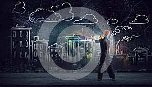 Builder man using media interface . Mixed media