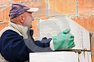 Builder or mason at work