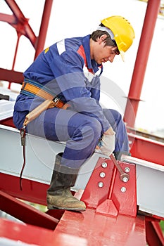 Builder millwright worker at construction site