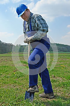 Builder with shovel