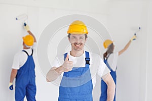 Builder in showing thumbs up