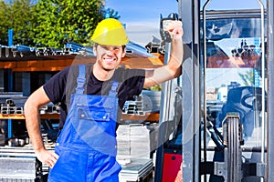 Builder with site pallet transporter or lift fork truck