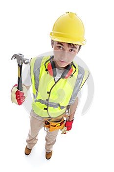 Builder standing with hammer