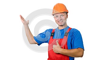 Builder in uniform pointing up