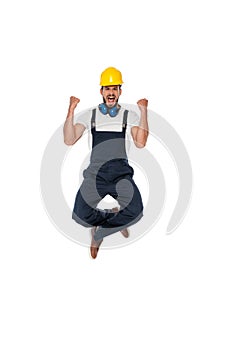 Builder in uniform showing yeah gesture isolated on white