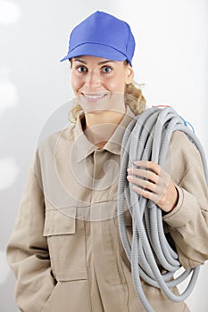builder woman holding cables