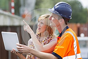 Builder, Woman and Laptop