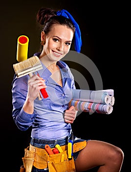 Builder woman witn wallpaper.