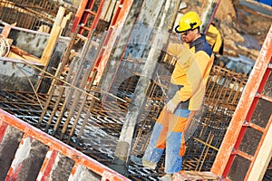 Builder worker at concrete work