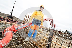 Builder worker at concrete work