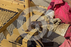 Builder worker holding connecting pin