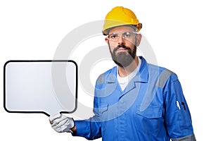 Builder worker in protective construction in yellow helmet holding white board with copyspace, isolated on white background