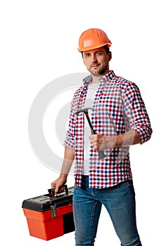 Builder worker in yellow hard hat and shirt holding hammer.