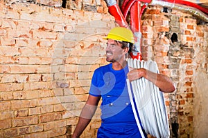 Builder working on construction site