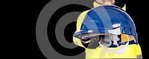 A builder in yellow helmet, bright yellow reflective hi-visibility fleeceand  safety gloves white background with space for text