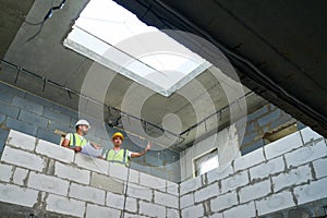 Builders on Construction Site