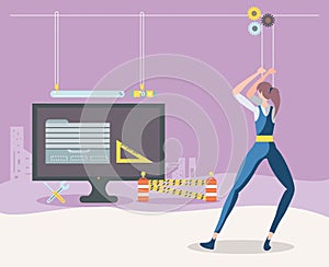 builders and desktop with webpage under cosntruction photo