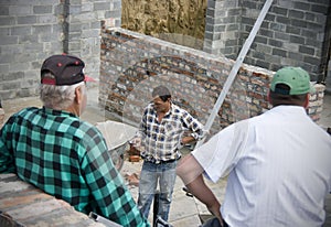 Builders having break photo