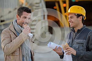 Builders having lunch break