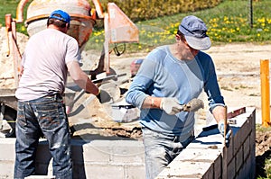 Builders on house site