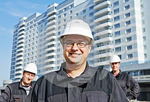 Builders team at construction site