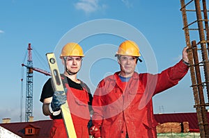 Builders workers at construction photo