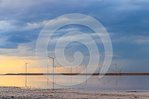 Building and assembling a construction wind turbines farm by crane