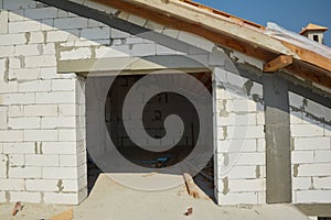 Building Attic Construction from aerated concrete blocks, eathqueke safety reinforcement and wooden roof