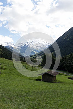 A building is Austrian Alps near snowy mountains