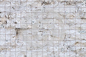 Building background prepared surface of the facade wall of the building with a fixed rusted mesh for cementing and