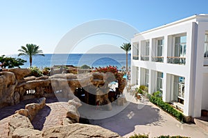 The building and beach at luxury hotel