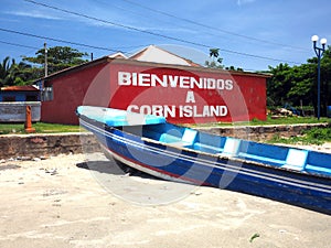 building on beach with welcome sign Brig Bay Big Corn Island Nicaragua
