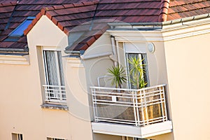 building with beautiful flowers in a small balcony