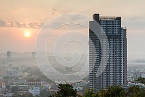 Building with beautiful skyscrape during sunrise at Pattaya city, Thailand photo