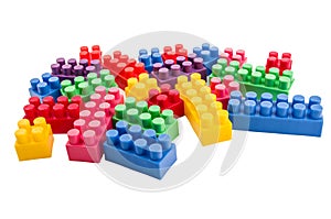 Building blocks scattered on a white background