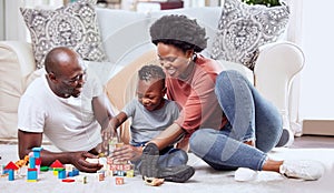 Building blocks, toys and black family playing on a living room floor happy, love and bonding in their home. Child