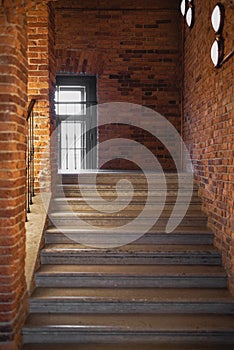 The building of a brick house with a flight of stairs. Flight of stairs