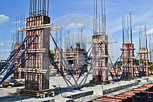 Building cement pillar in construct site photo