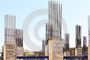 Building cement pillar in construction site with blue sky